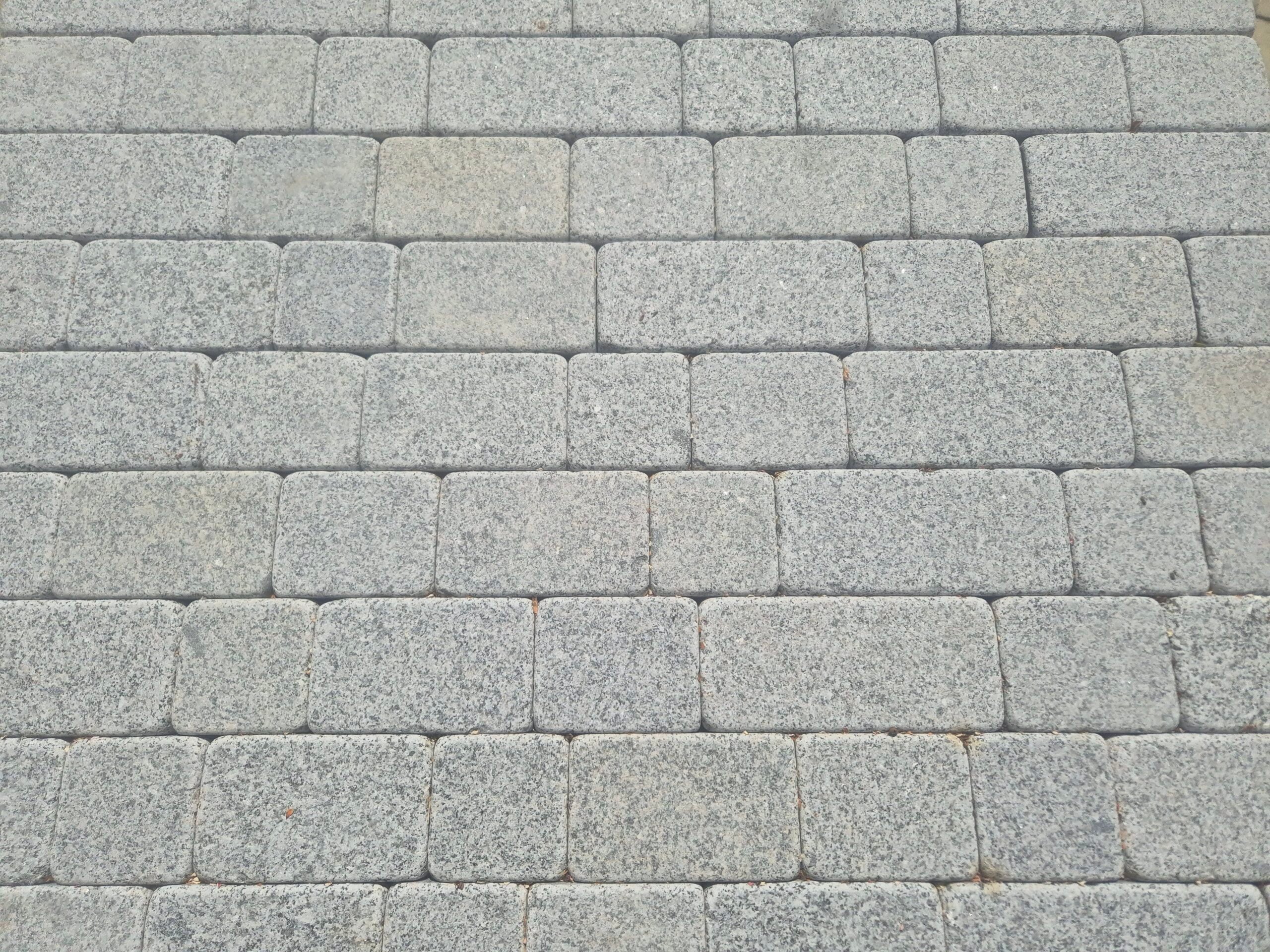 Mixed Size Tumbled and sawn Grey granite cobble